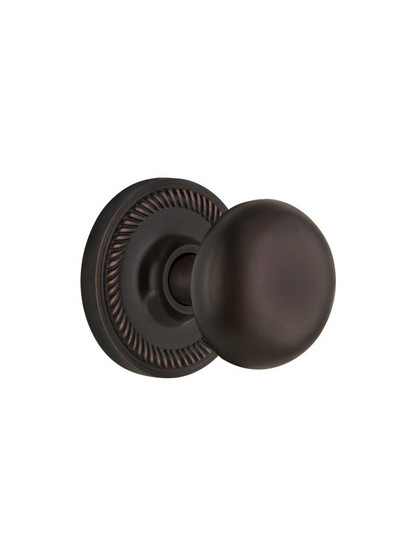 Rope Rosette Door Set With Classic Round Knobs in Timeless Bronze.